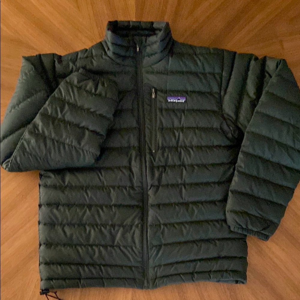 The OG Patagonia Dark Green Down Puffer Jacket
Unisex XS